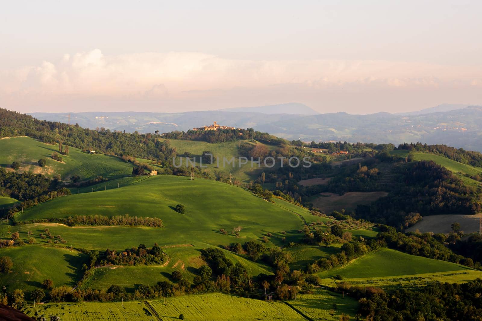View di Montefabbri from Belvedere Fogliense, Marche, Italy, at evening before the sunset