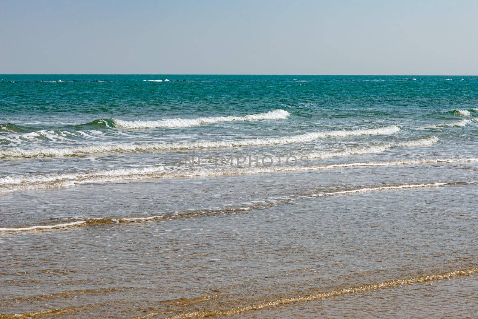 View of the Adriatic Sea from the sandy beach in Pesaro, Italy by MaxalTamor