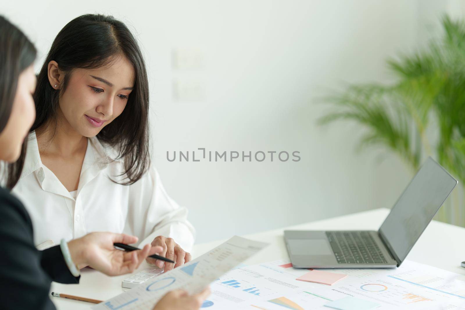 Group of Business woman and Accountant checking data document for investigation of corruption account. Anti Bribery concept. by itchaznong