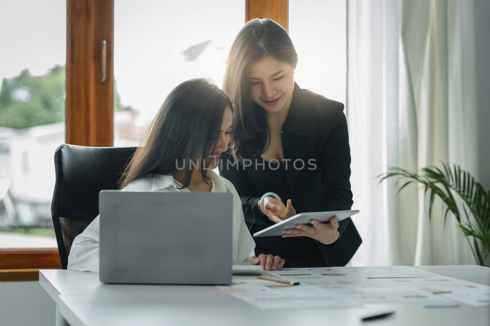 Business team hands at working with financial plan, meeting, discussion, brainstrom with tablet on office desk, Meeting concept