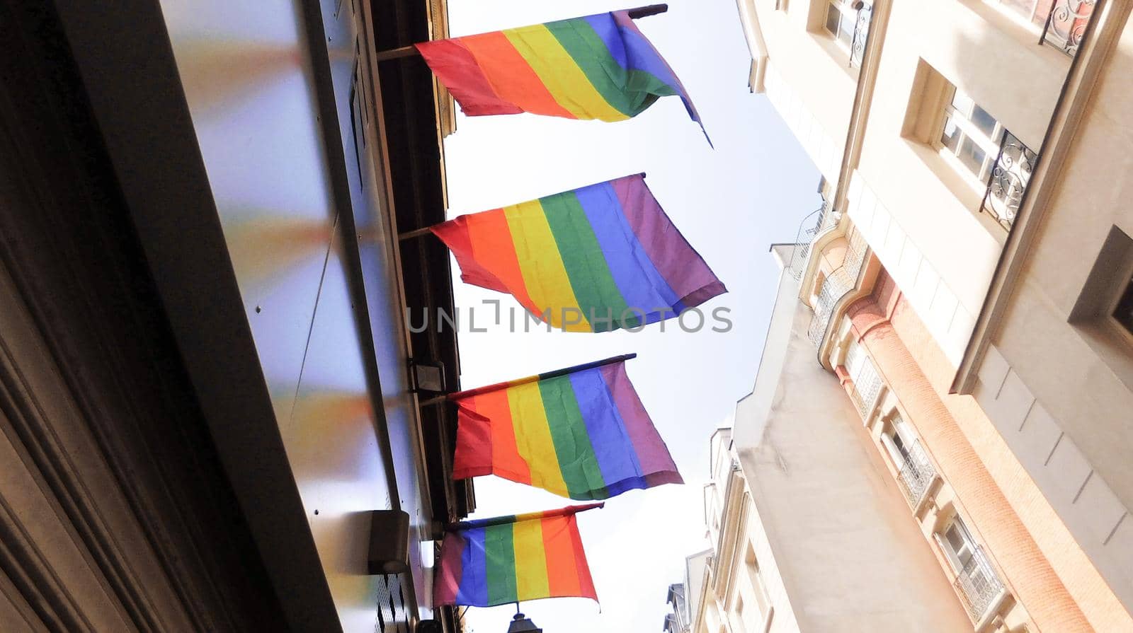 The rainbow flag, gay pride or LGBTQ symbol on light