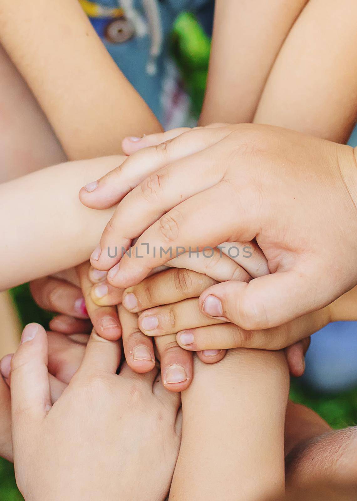 Children's hands together, street games. Selective focus. by yanadjana