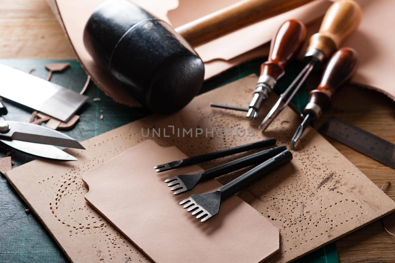 Working with vegetable tanned leather. Leather and the craft tools.