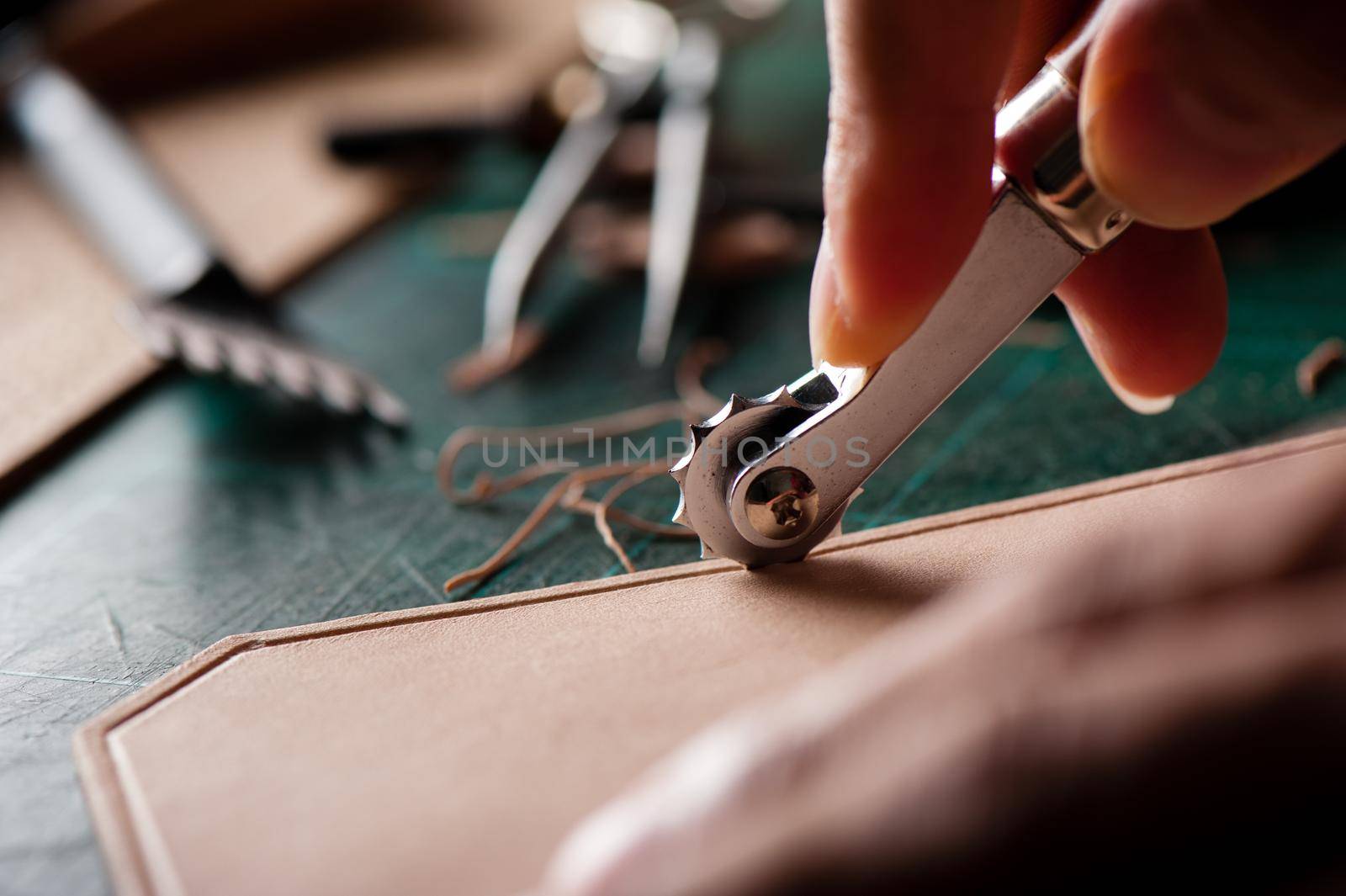 Working with vegetable tanned leather. Leather and the craft tools.