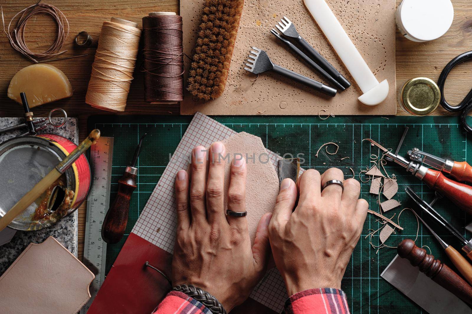 Working with vegetable tanned leather. Leather and the craft tools.