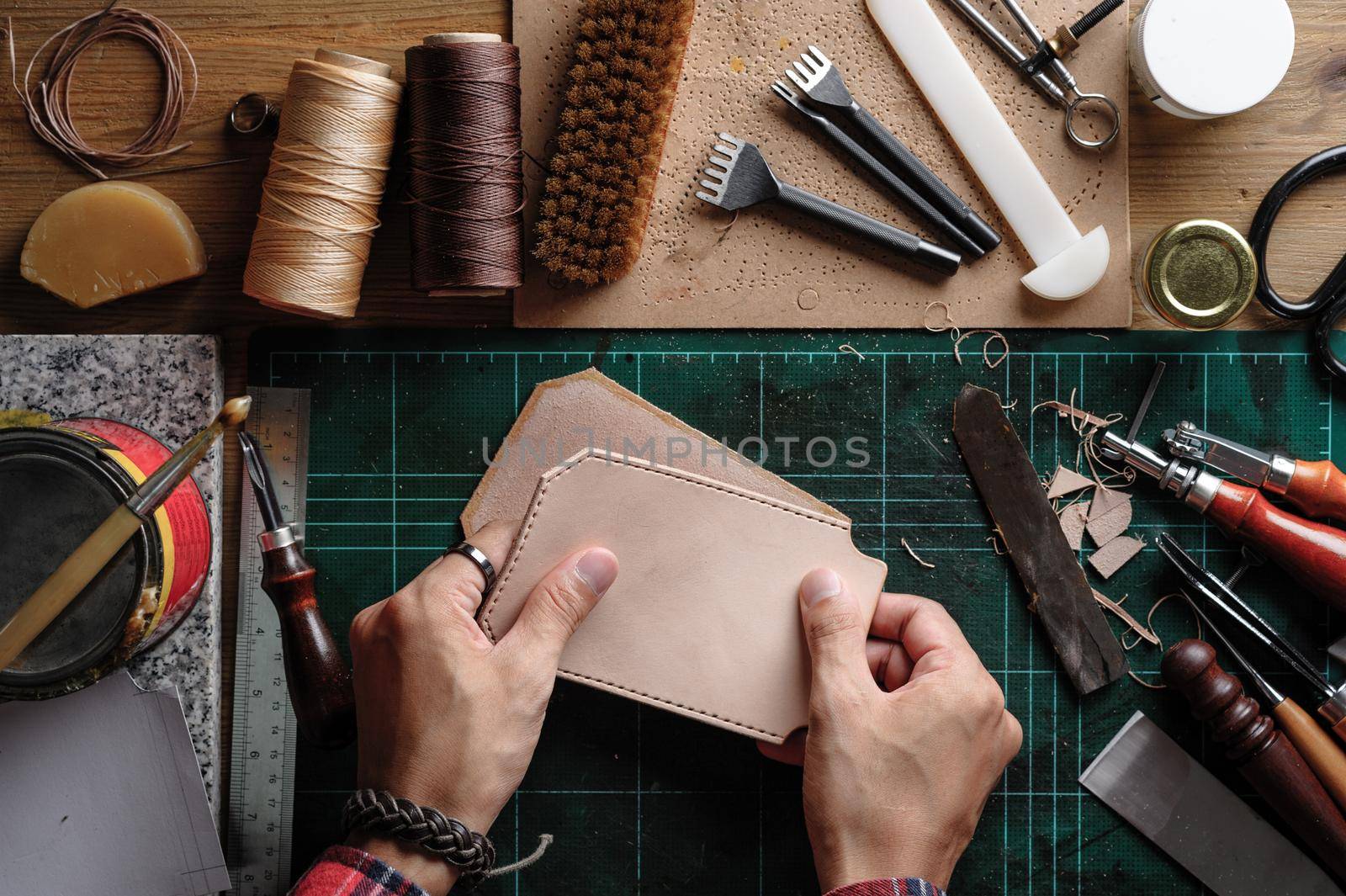 Working with vegetable tanned leather. Leather and the craft tools.