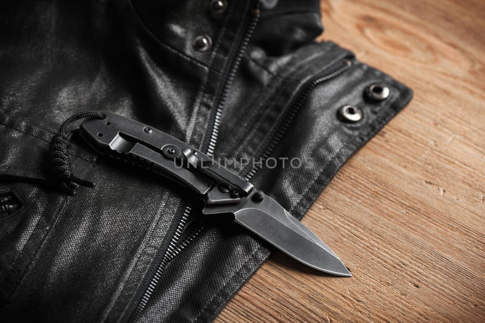 stainless steel pocketknife with blackwash finish on blade and handle