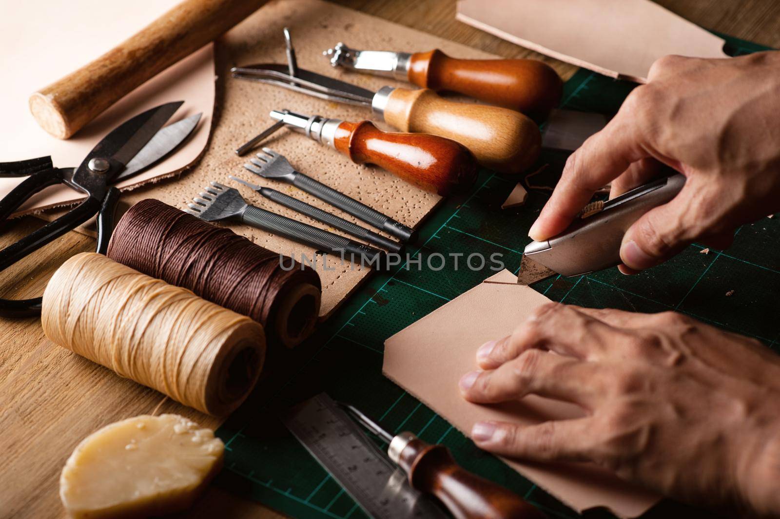 Working with vegetable tanned leather. Leather and the craft tools.