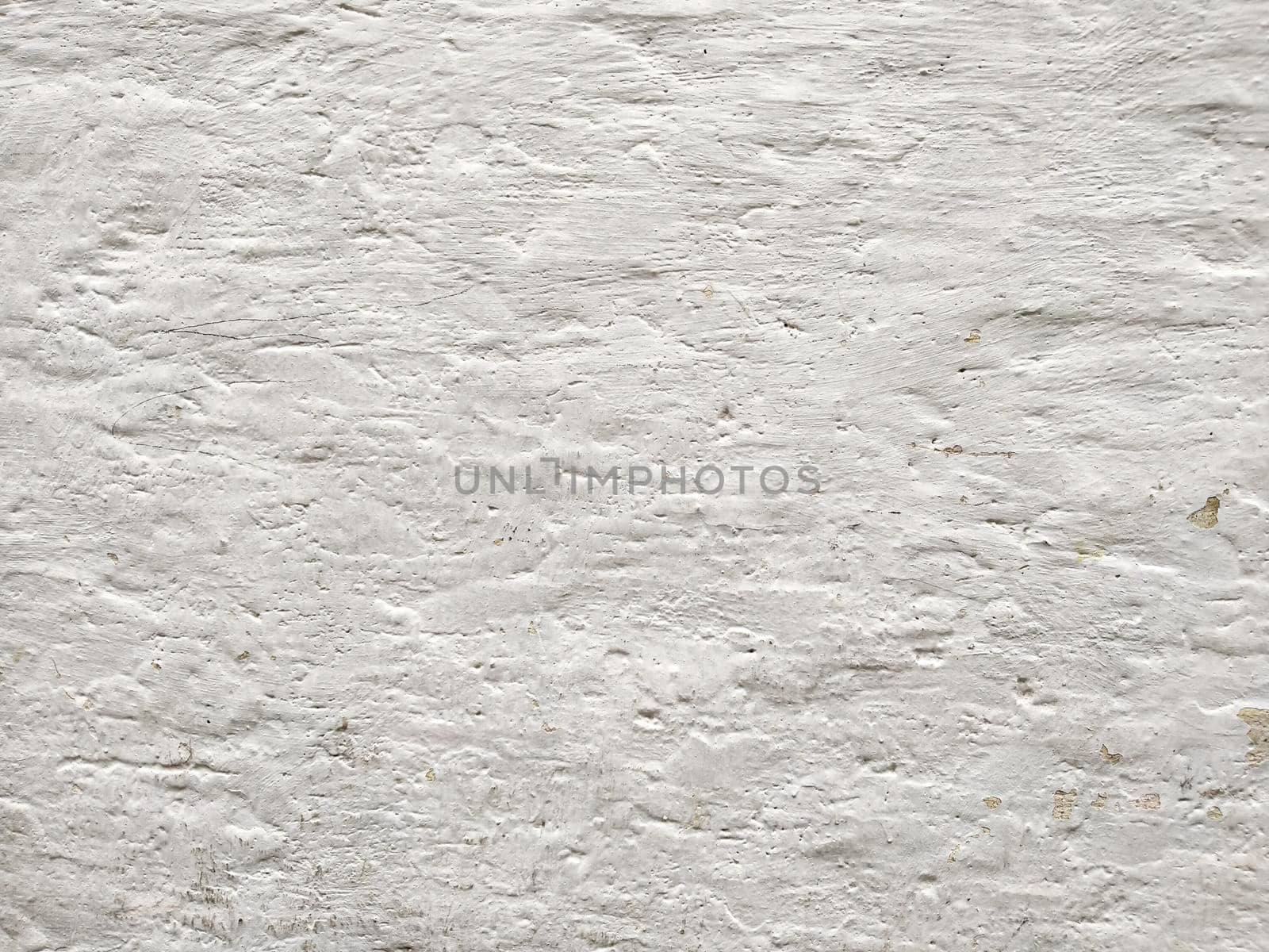 old wall with paint stains. background image in  grunge white concrete old texture wall by Petrichor