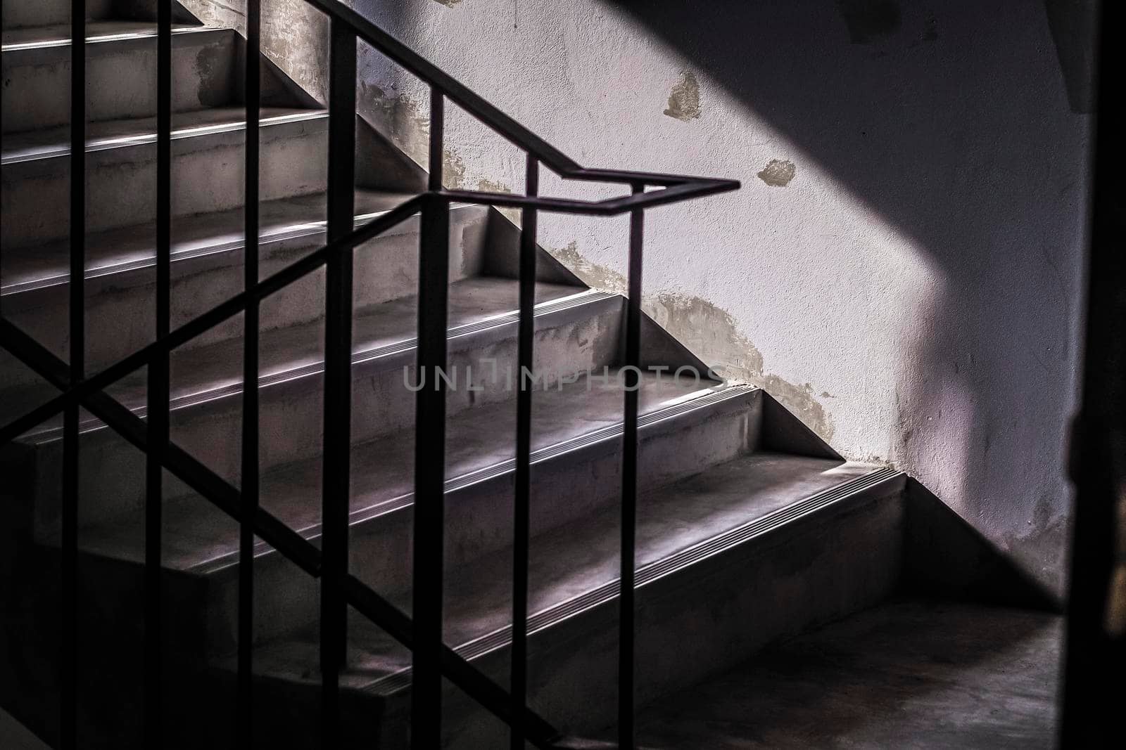 Emergency Fire Concrete Staircase. Concrete Stairs with Sunlight. Exit Escape concept idea by Petrichor
