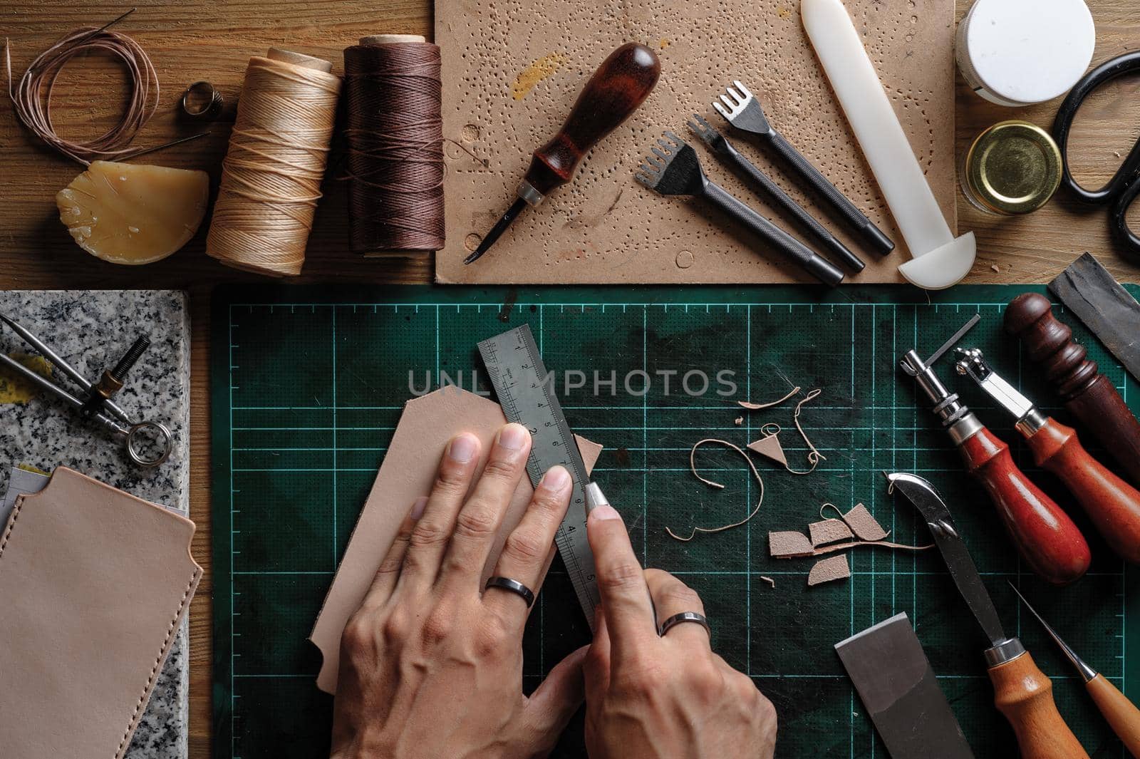 Working with vegetable tanned leather. Leather and the craft tools.