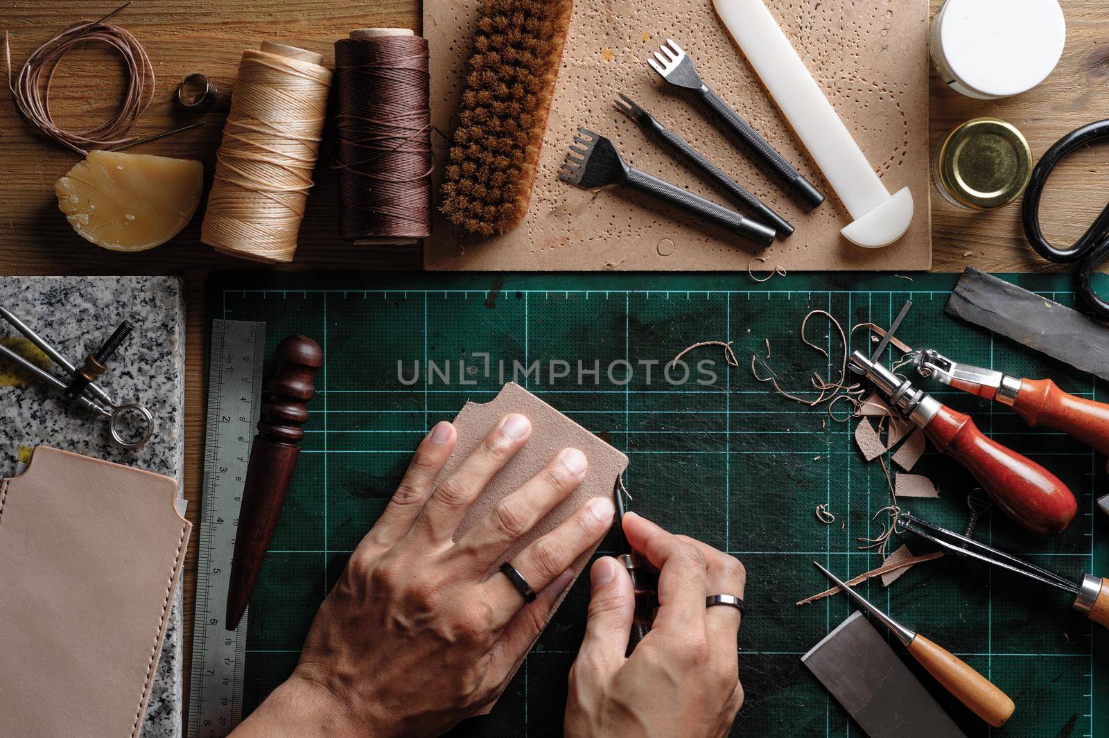 Working with vegetable tanned leather. Leather and the craft tools.