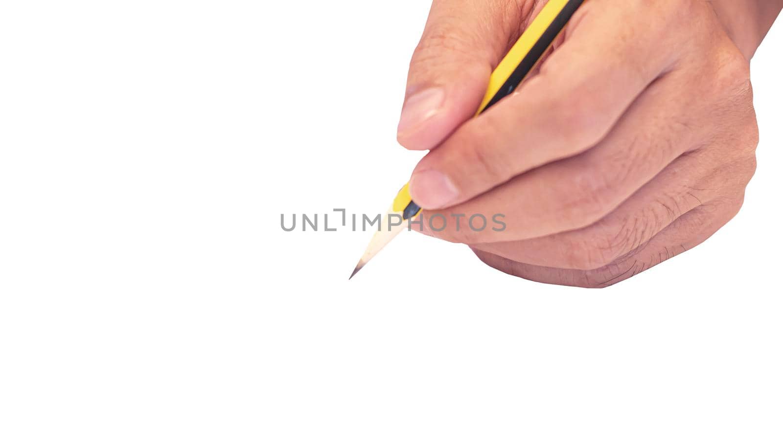hand holding a pencil isolated on white background . Close Up on a man's hand writing on paper with a pencil  .Planning business idea background . leave note or message concept.