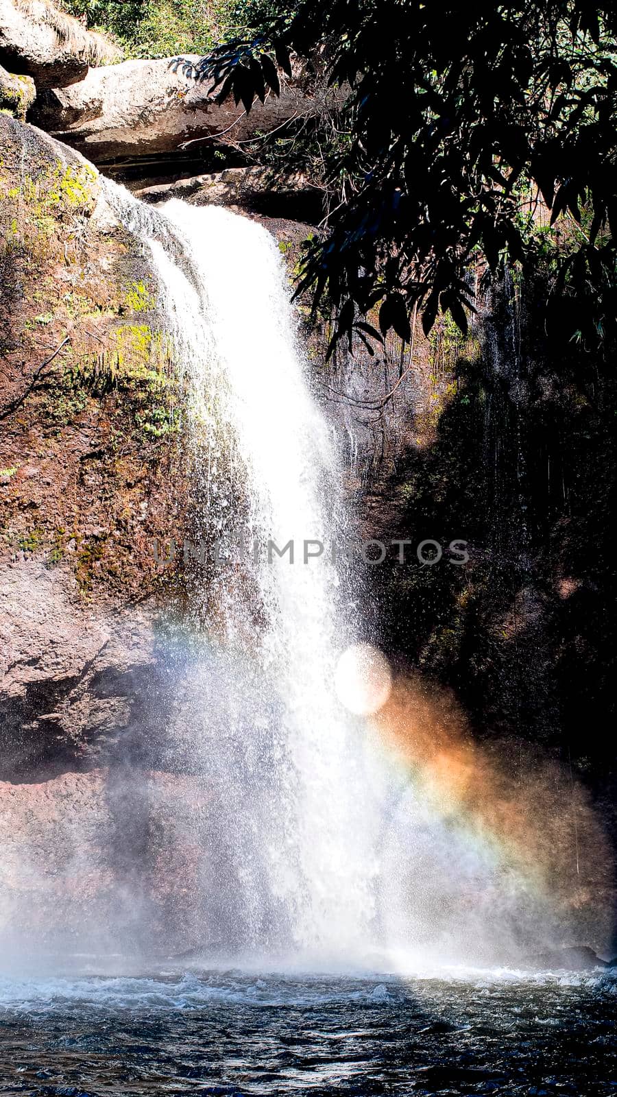 Rainbow waterfall in Haew Suwat Waterfall in Khao Yai National Park Thailand. by Petrichor