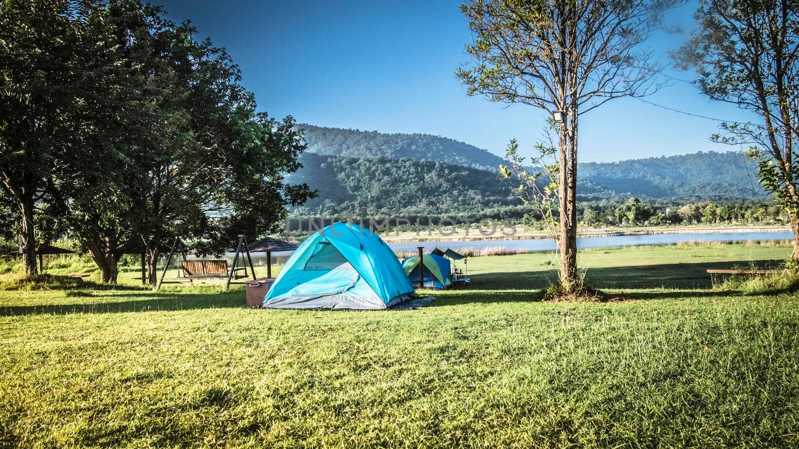 tourist tent camping in mountains near lake, Khao Yai National park, Thailand