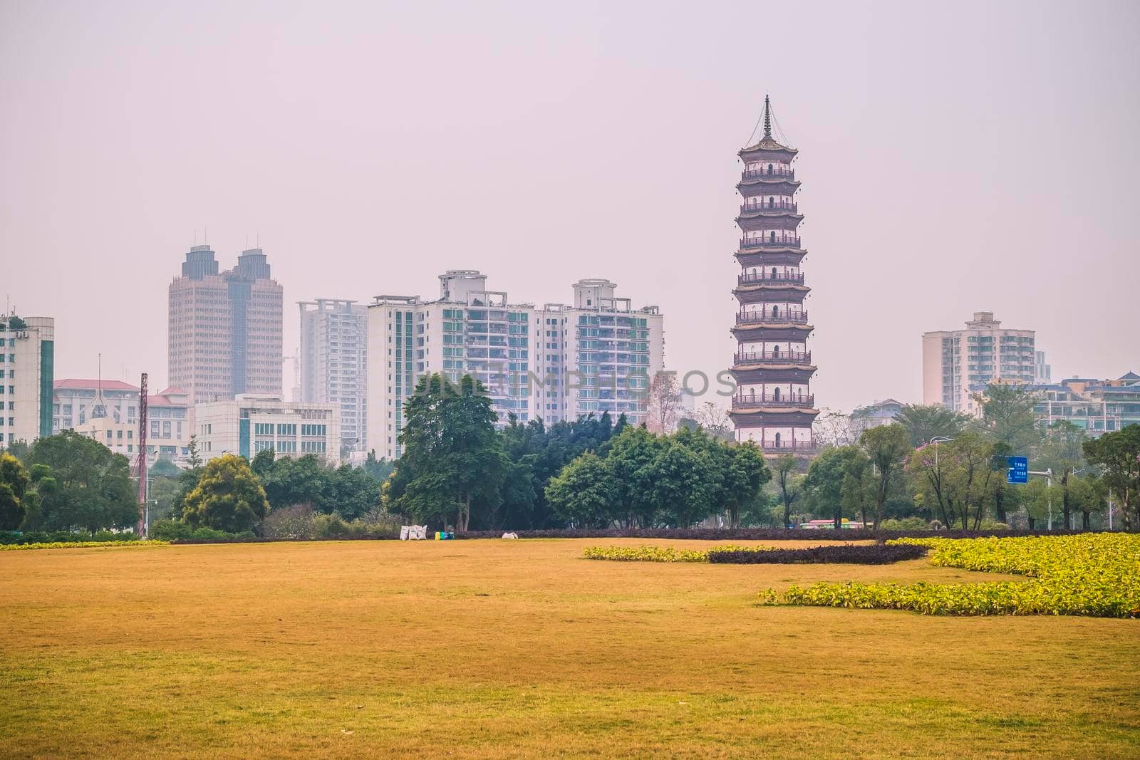 December 2019 Guangzhou China landscape urban design in city with scenic of high-rise building and main tourist attraction named The Temple of the Six Banyan Trees or Liurong Temple .