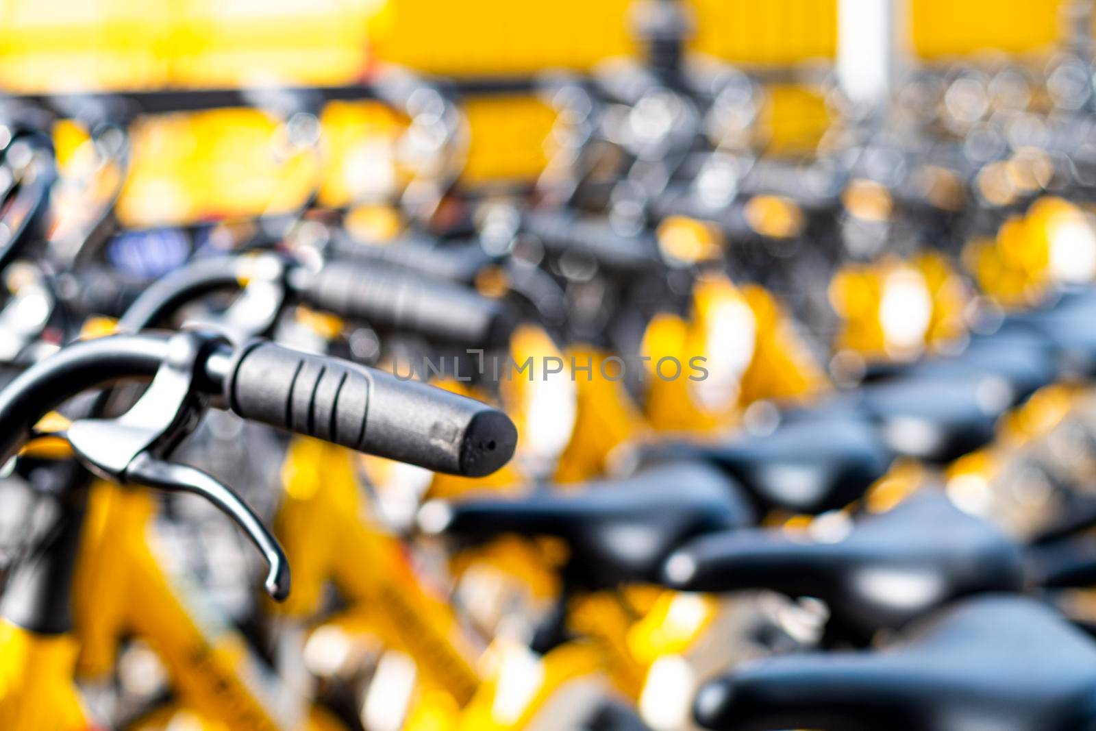 December 2019 Guangzhou china rental bikes found along the main street to serve public and connect from area to other. Bicycle parking sign in public park