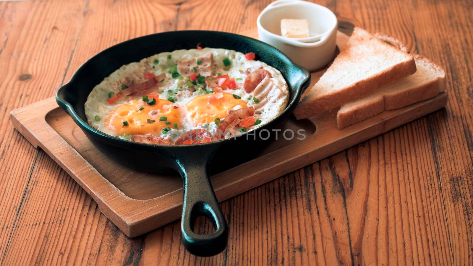 Bread with Pan Fried Egg with Toppings for breakfast