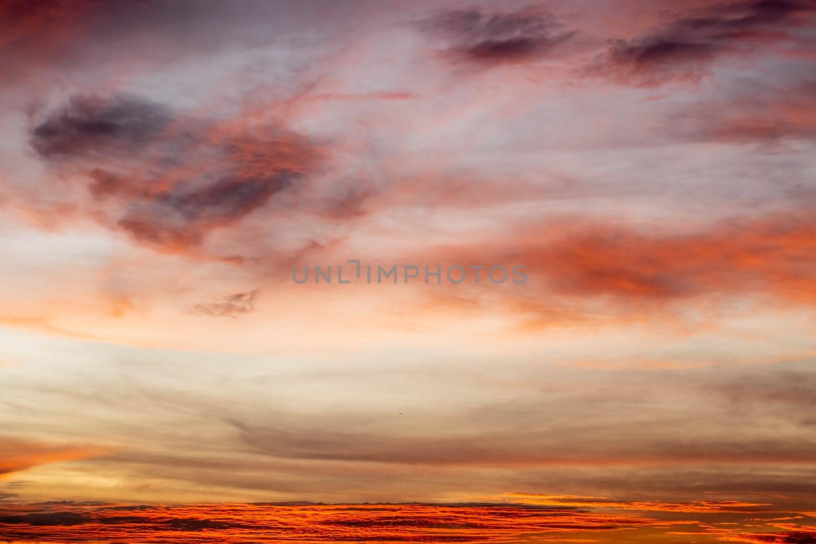 Sunset Orange color cloudy Sky Background In The Evening time.