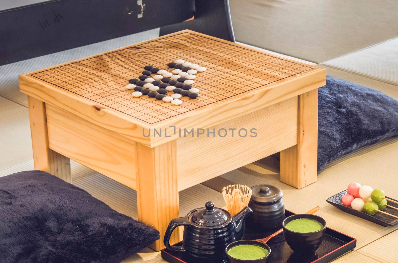 Traditional Japanese Tabletop Go strategy Games with green tea set