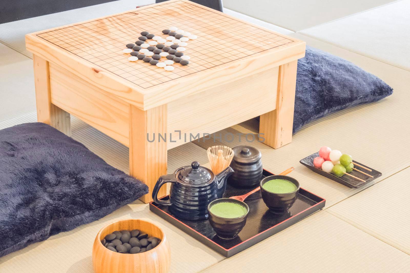 Traditional Japanese Tabletop Go strategy Games with green tea set