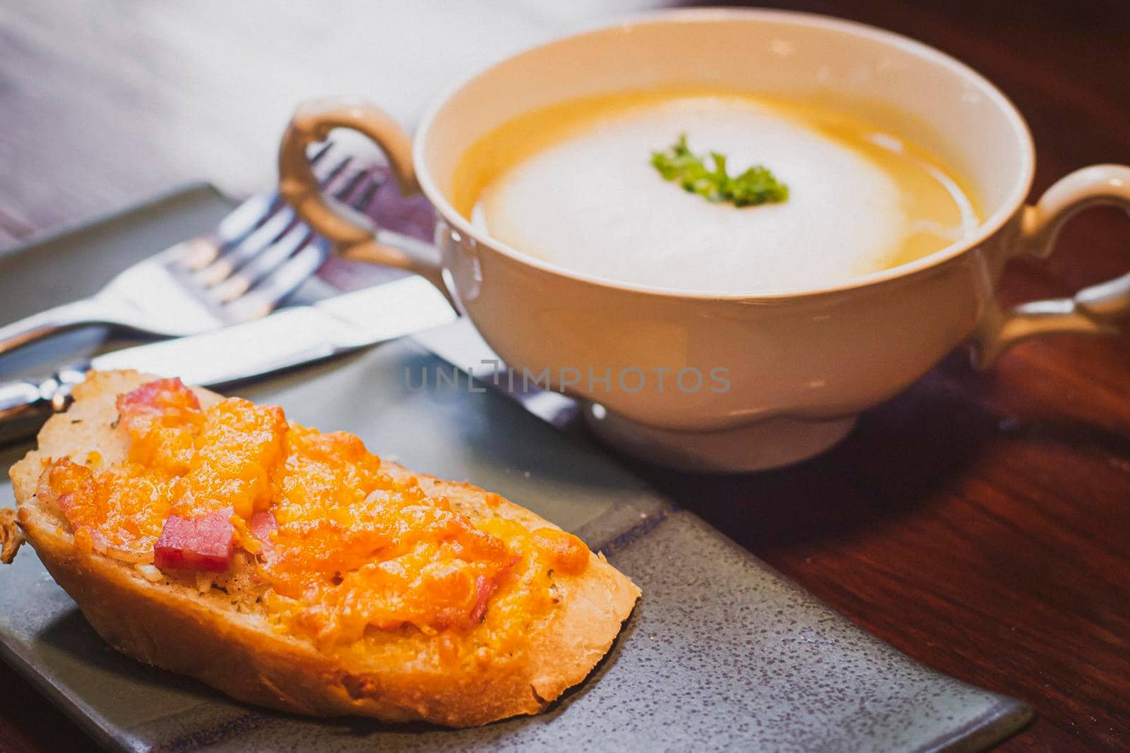 Mushroom Soup With Garlic Bread healthy beakfast in caramic blow and plate object still life.