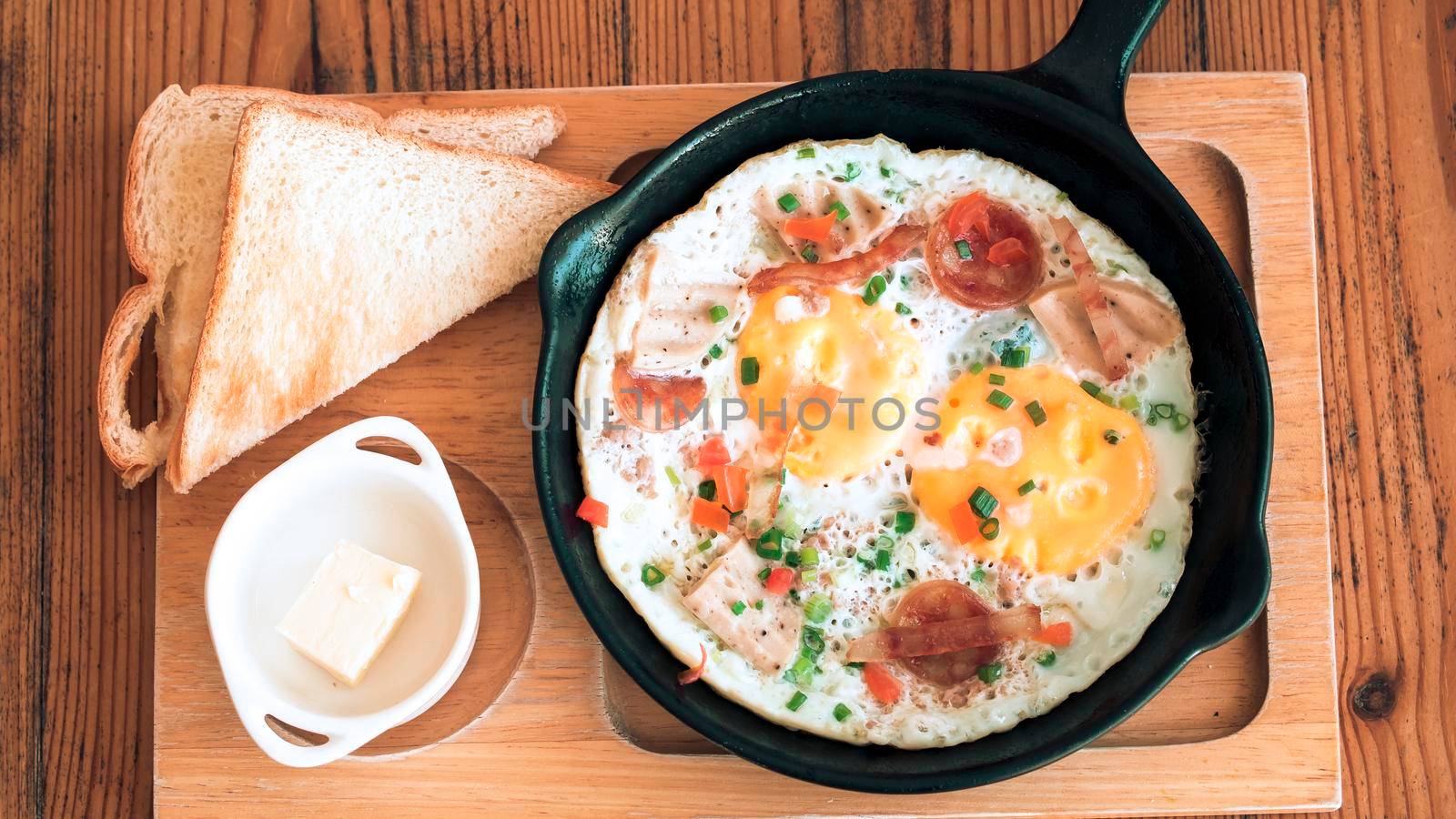 Bread with Pan Fried Egg with Toppings for breakfast