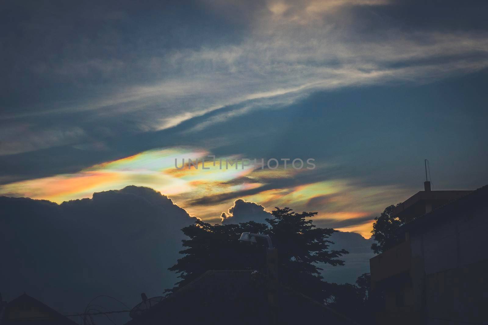 A Rare Look at an Iridescent Cloud. fire rainbows or rainbow clouds. Iridescent Pileus Cloud colorful optical phenomenon sky