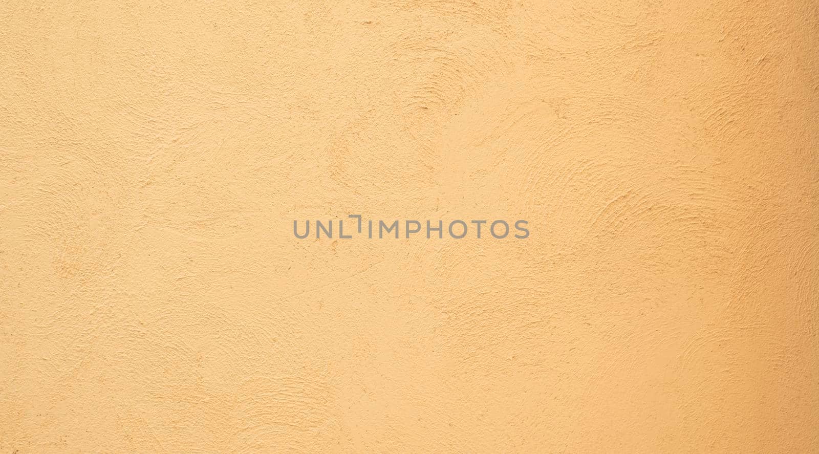 Yellow orange Beige painted stucco wall construction. Pattern Background texture.