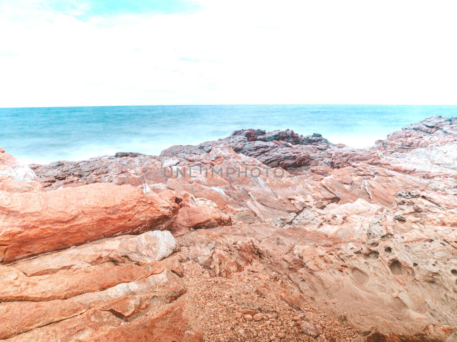 Long exposure Sea rocks Romantic atmosphere in peaceful morning at sea.  Magnificent view in the blue hour at the Black sea coast, Bulgaria