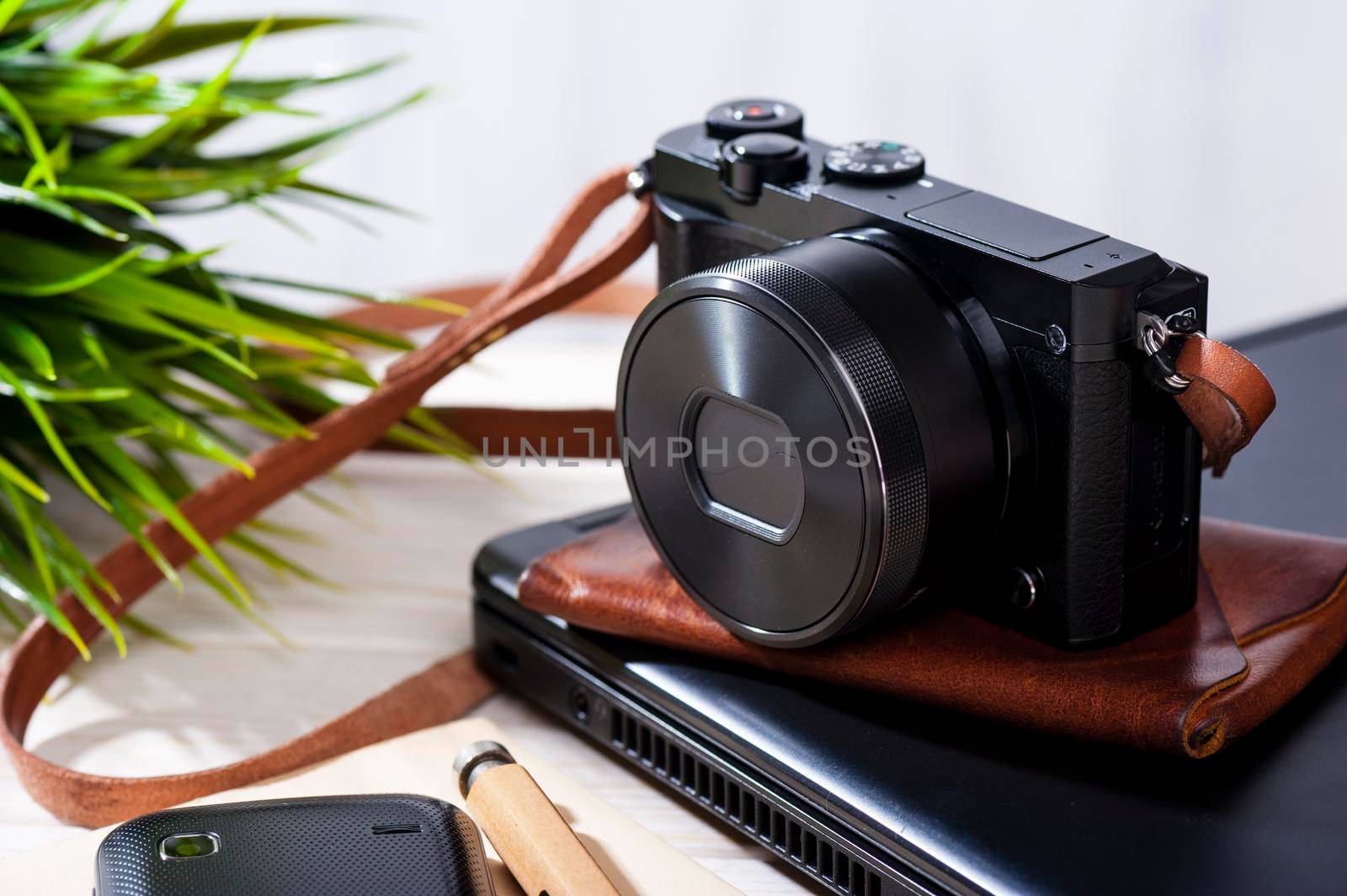 mirrorless camera with leather strap by norgal