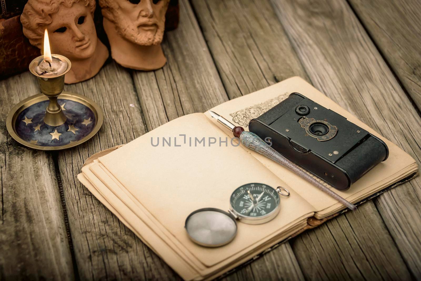 Traveler's accessories and costume on wooden background with copy space , travel concept