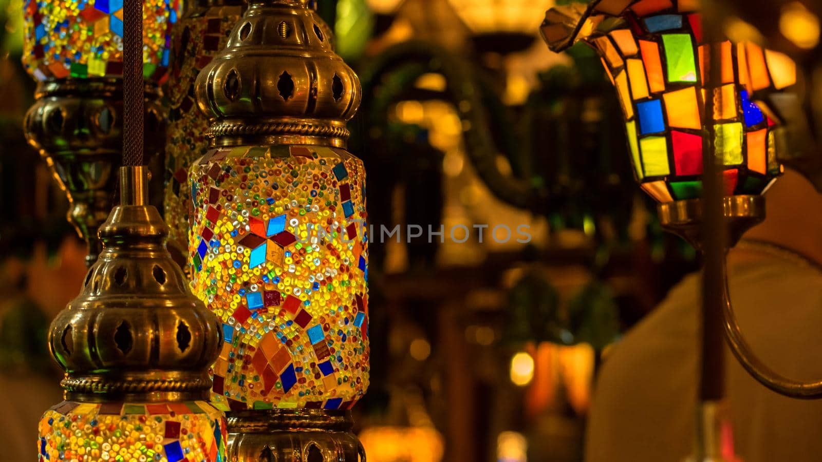 Traditional handmade Turkish lamps in souvenir shop. Mosaic of colored glass. Lamps Orientals au Grand Bazar d'Istanbul Turquie