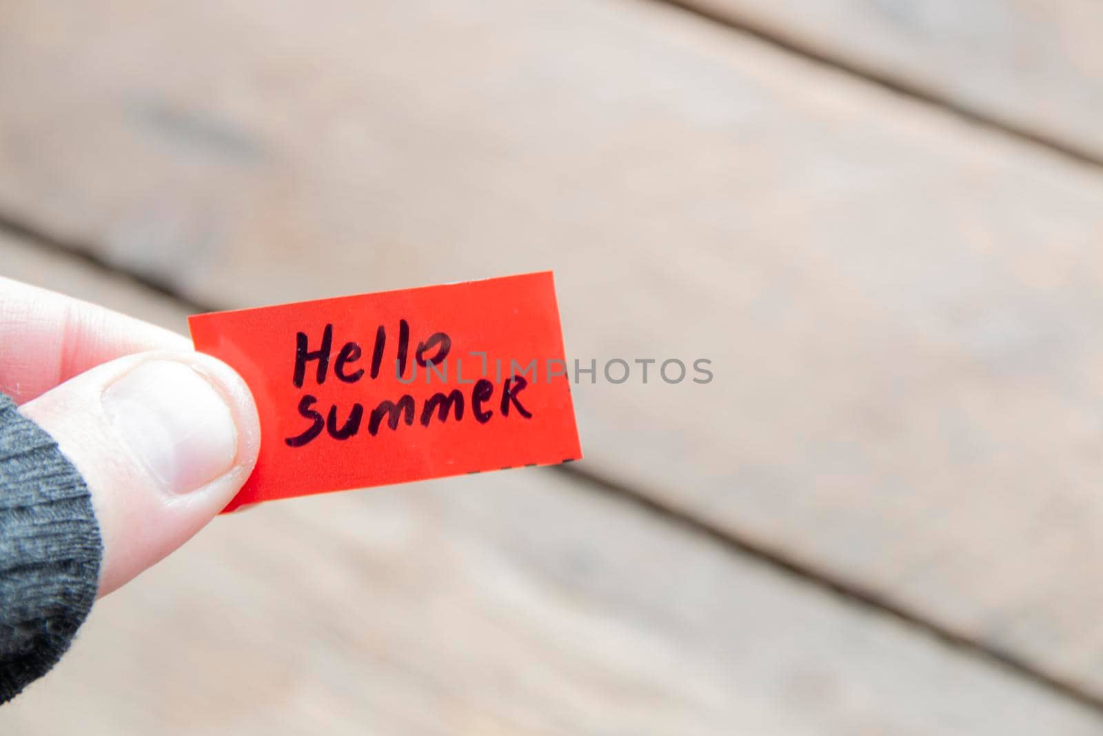 Hello summer concept. The inscription on the red tag. by Markgraf