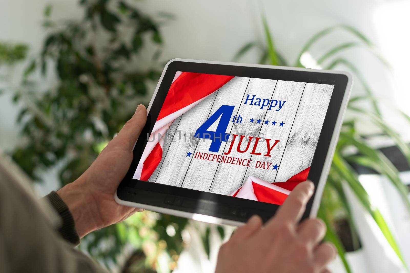 United states flag on white, weathered clapboard background with july 4th greeting by Andelov13