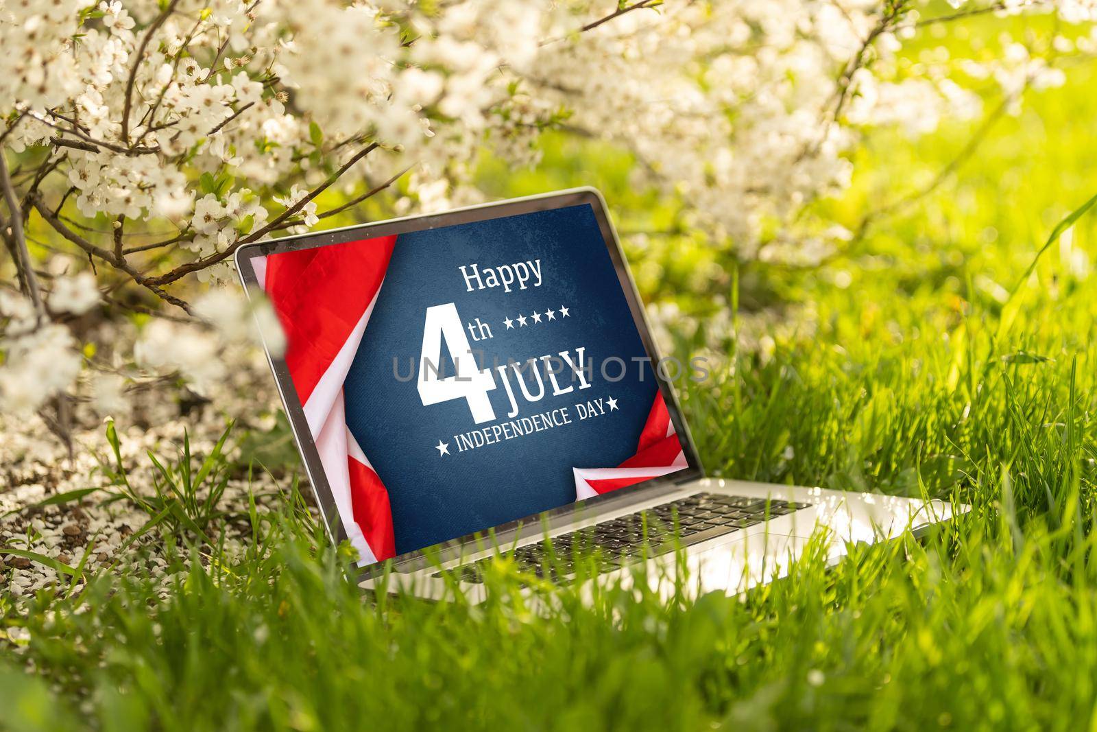 man searching website with information of the celebration of Independence Day hands of a man looking in web a site with information of 4th July by Andelov13