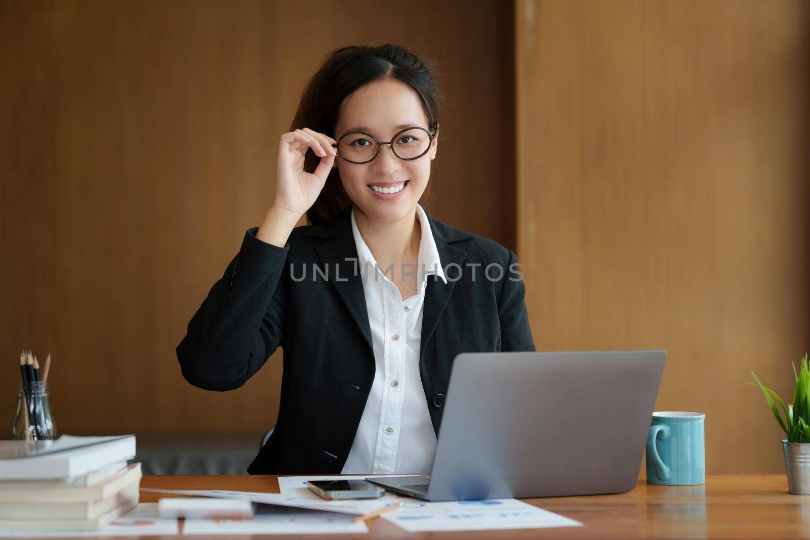 Image of Young woman working online on laptop computer. studying or working from home online concept