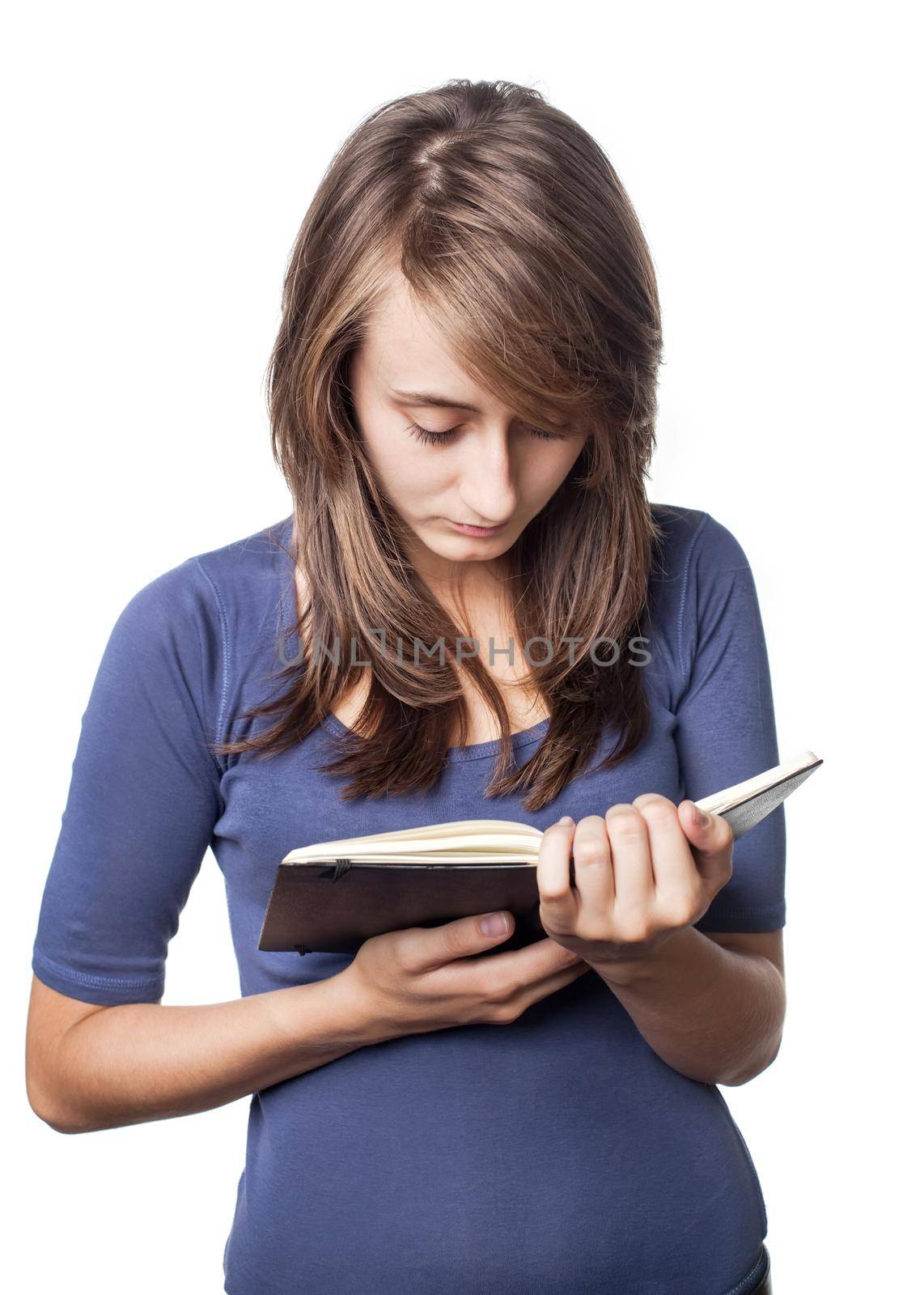 Female student reads her notebook