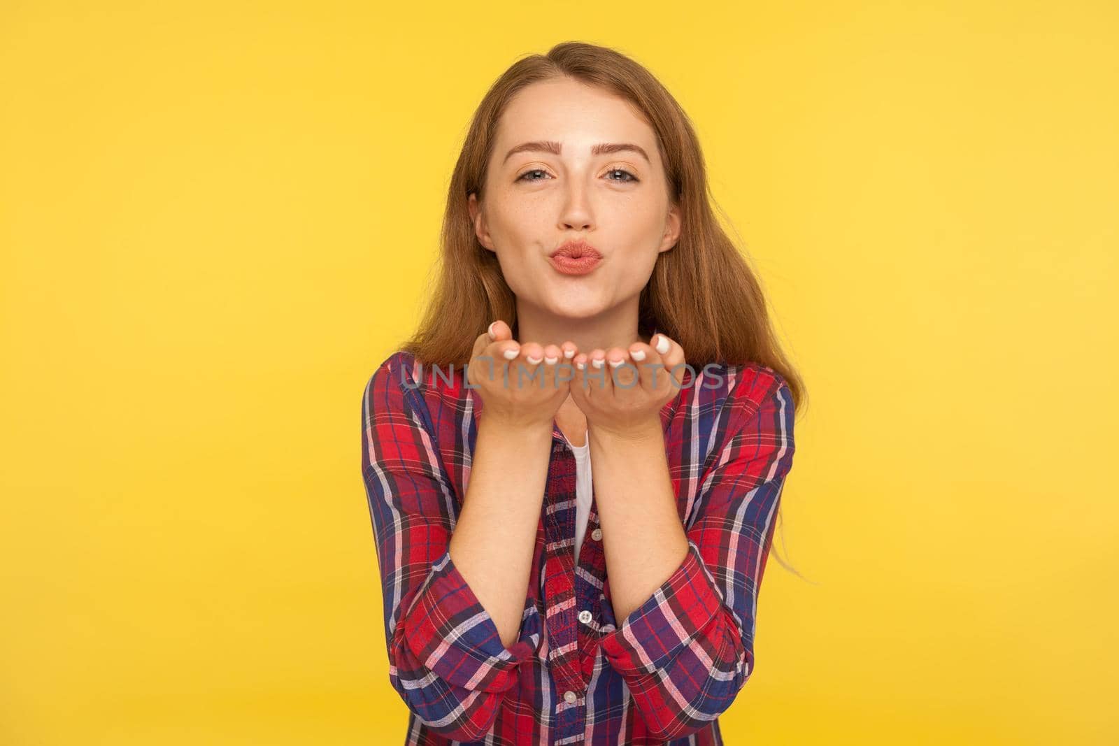 Portrait of young emotional woman on yellow background. by Khosro1