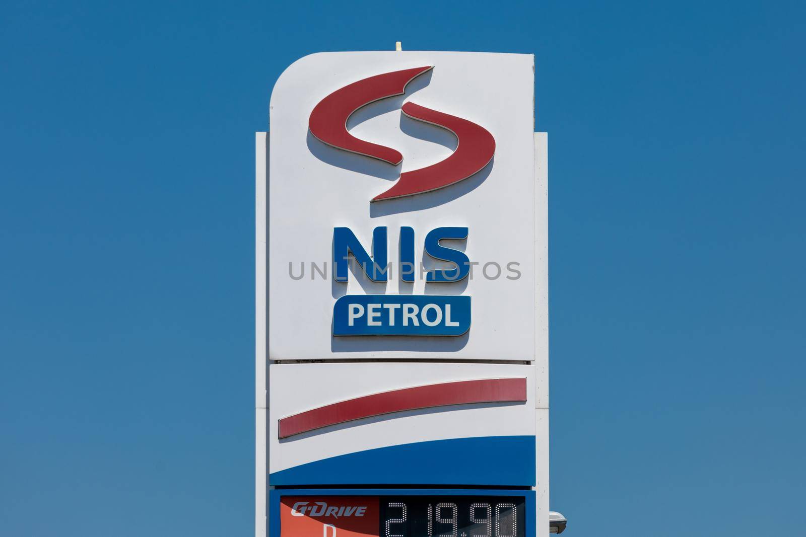 Valjevo, Serbia - June 20, 2022: Logo and sign of NIS Petrol on gas station. NIS Petrol (Oil Industry of Serbia) is an largest oil refining company in Serbia