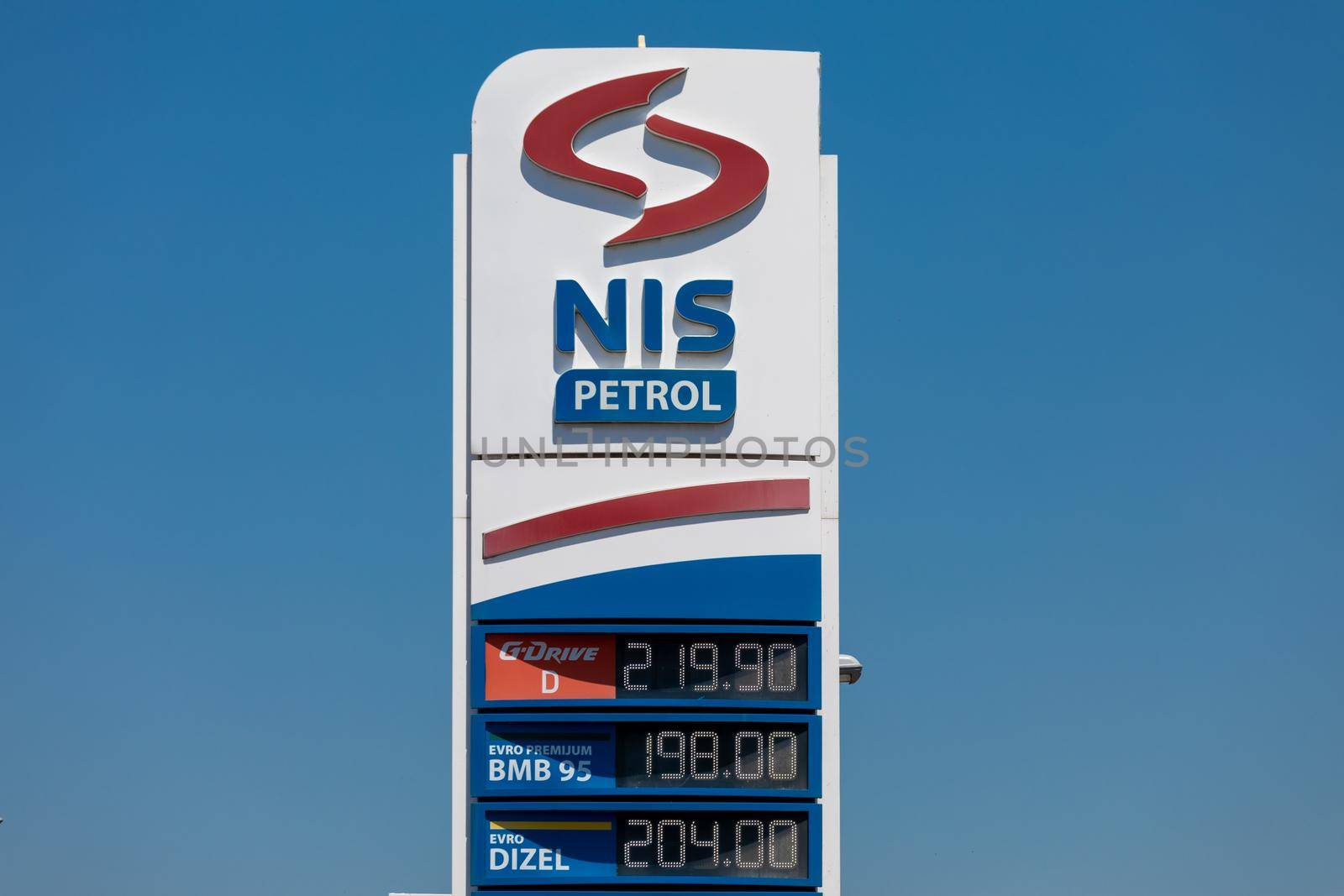 Valjevo, Serbia - June 20, 2022: Logo and sign of NIS Petrol on gas station. NIS Petrol (Oil Industry of Serbia) is an largest oil refining company in Serbia