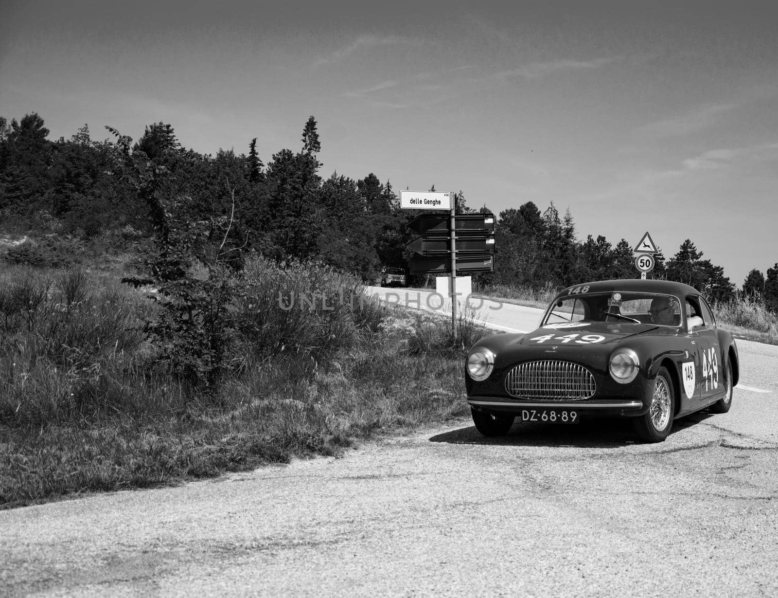 URBINO, ITALY - JUN 16 - 2022 : CISITALIA 202 SC BERLINETTA PININ FARINA 1948 on an old racing car in rally Mille Miglia 2022 the famous italian historical race (1927-1957