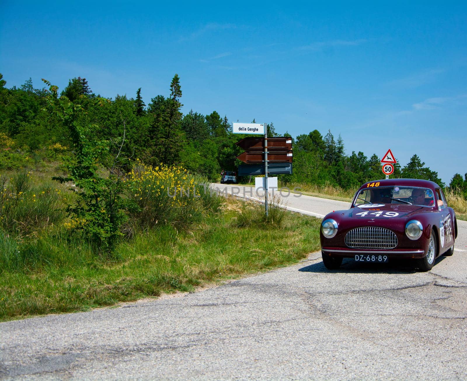 URBINO, ITALY - JUN 16 - 2022 : CISITALIA 202 SC BERLINETTA PININ FARINA 1948 on an old racing car in rally Mille Miglia 2022 the famous italian historical race (1927-1957