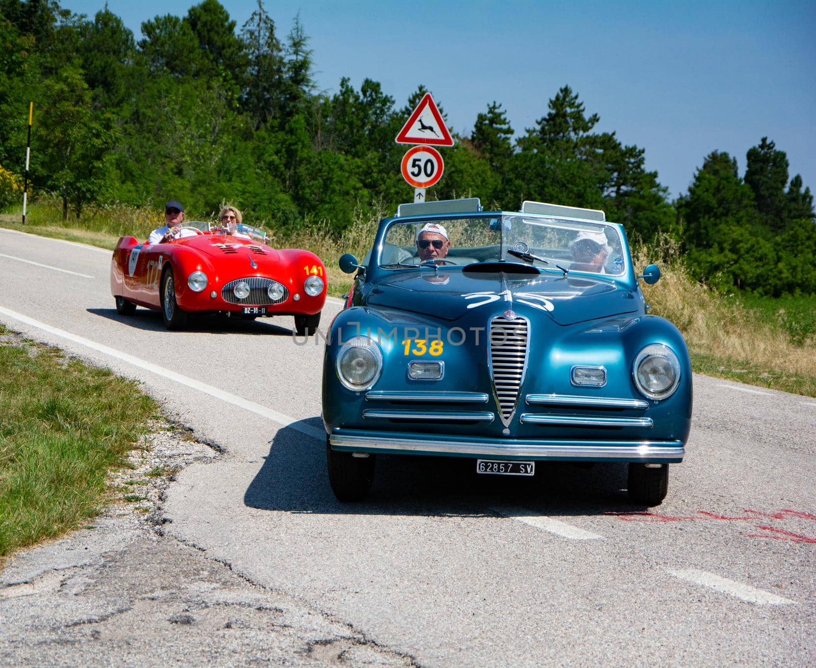 URBINO, ITALY - JUN 16 - 2022 : ALFA ROMEO 6C 2500 S CABRIOLET PININ FARINA 1947 on an old racing car in rally Mille Miglia 2022 the famous italian historical race (1927-1957