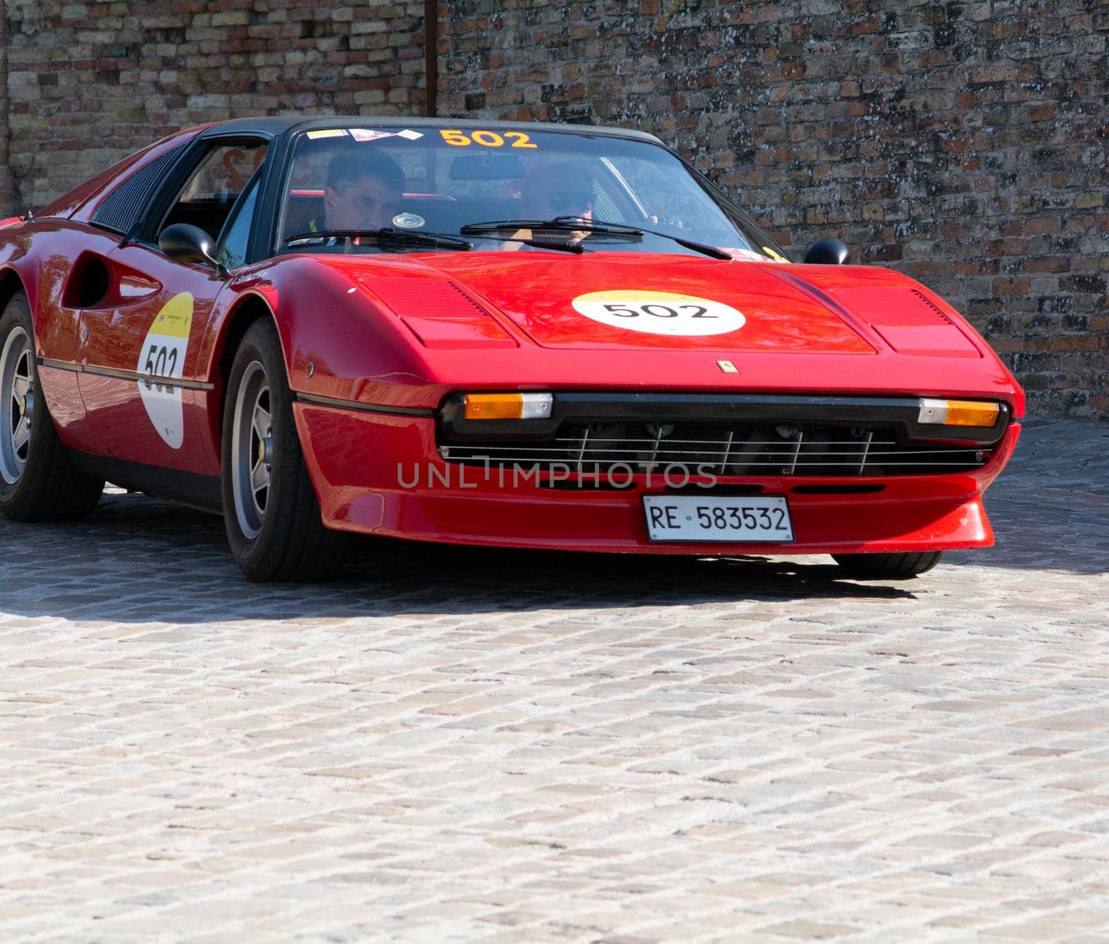 URBINO, ITALY - JUN 16 - 2022 : FERRARI TRIBUTE Ferrari 308 Gts IN an old racing car in rally Mille Miglia 2022