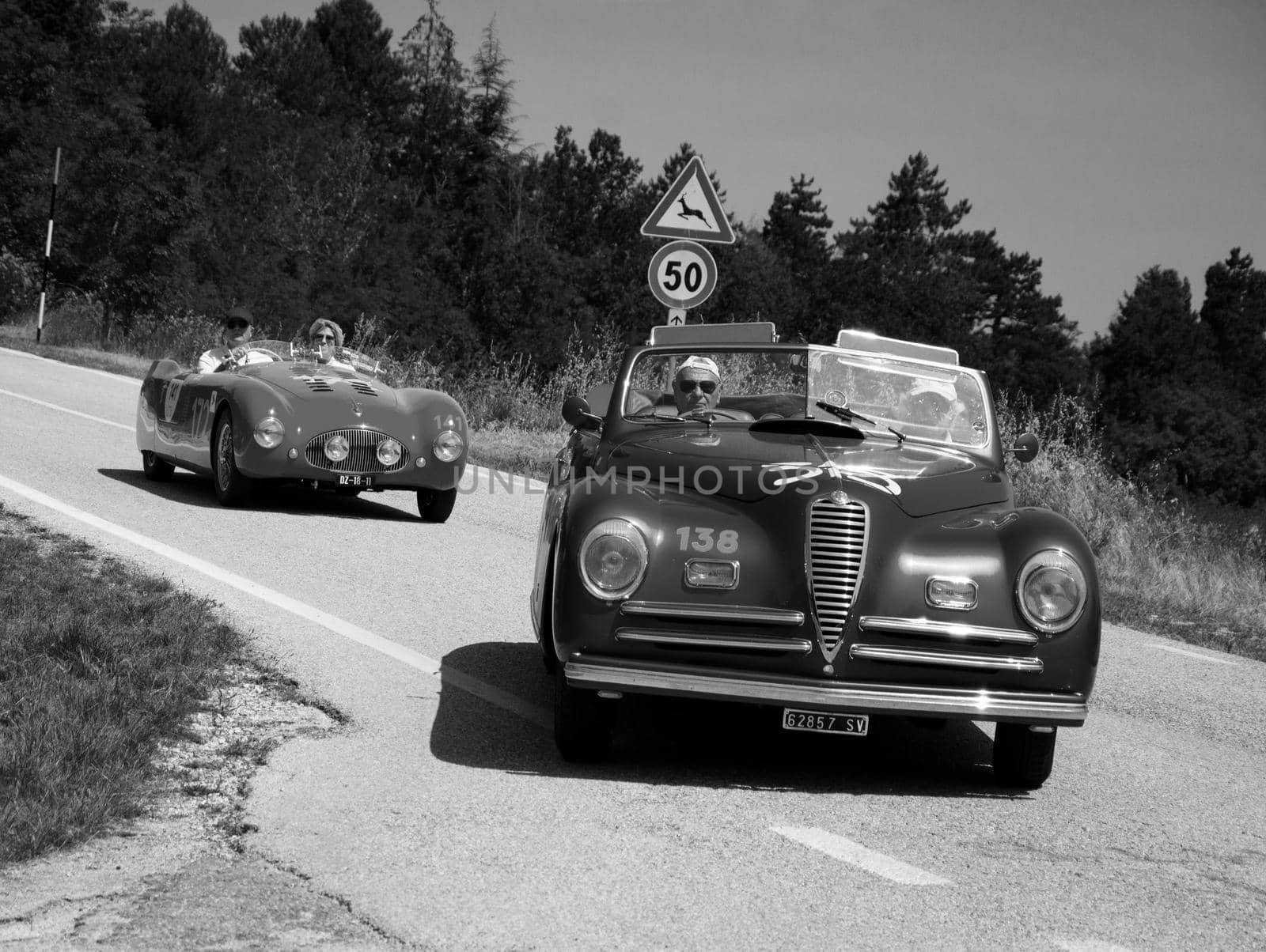 URBINO, ITALY - JUN 16 - 2022 : ALFA ROMEO 6C 2500 S CABRIOLET PININ FARINA 1947 on an old racing car in rally Mille Miglia 2022 the famous italian historical race (1927-1957