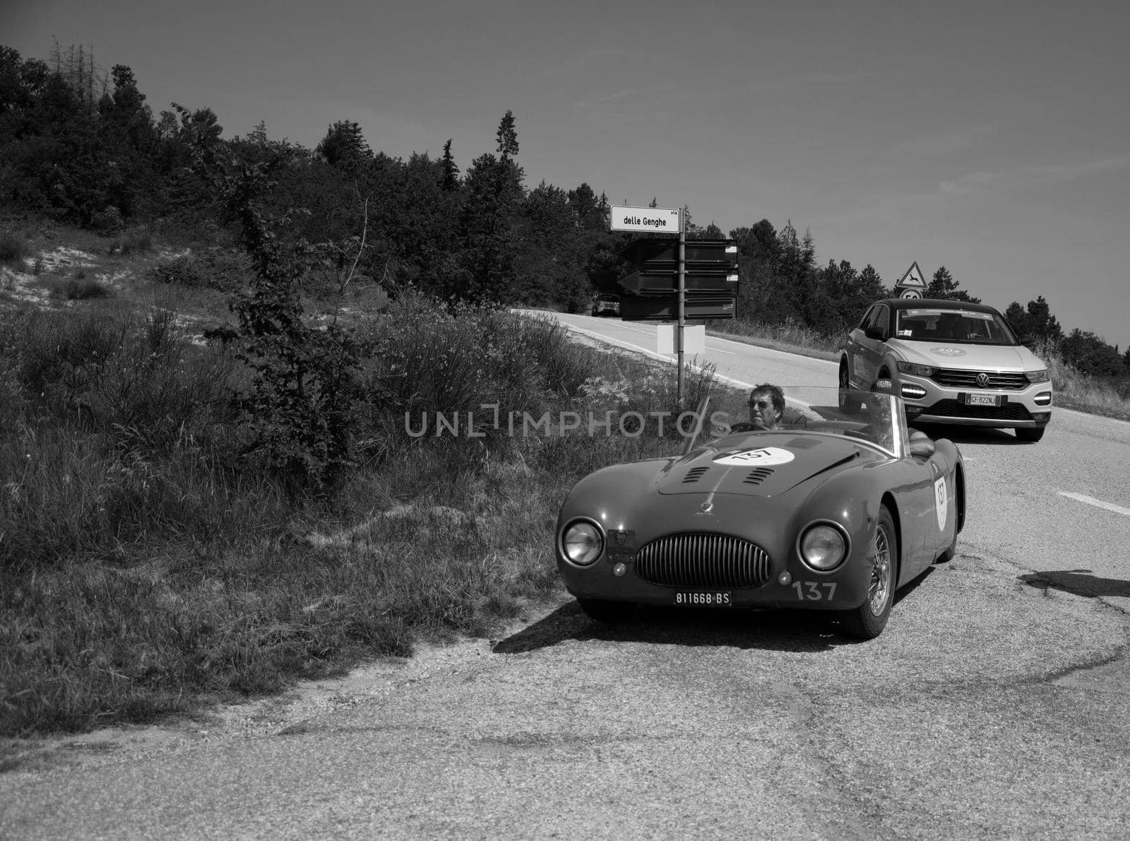 URBINO, ITALY - JUN 16 - 2022 : CISITALIA 202 S MM SPIDER NUVOLARI 1947 on an old racing car in rally Mille Miglia 2022 the famous italian historical race (1927-1957