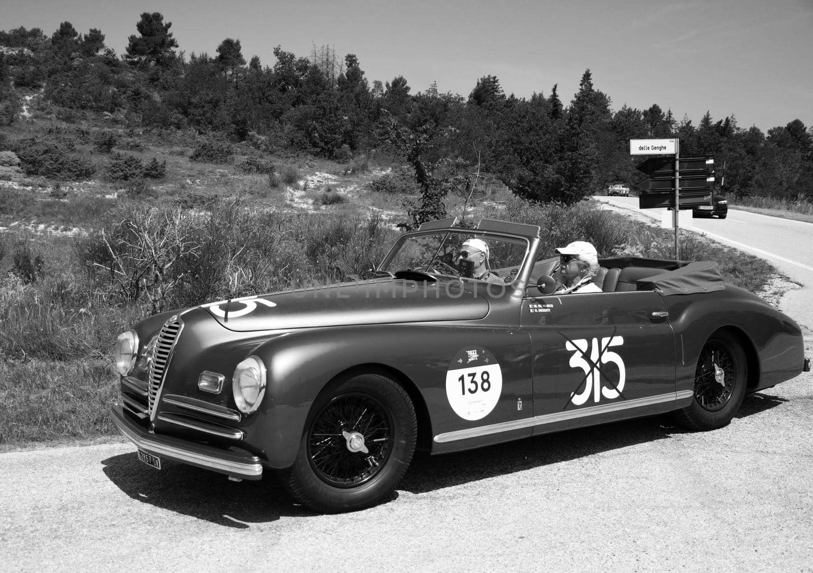 URBINO, ITALY - JUN 16 - 2022 : ALFA ROMEO 6C 2500 S CABRIOLET PININ FARINA 1947 on an old racing car in rally Mille Miglia 2022 the famous italian historical race (1927-1957