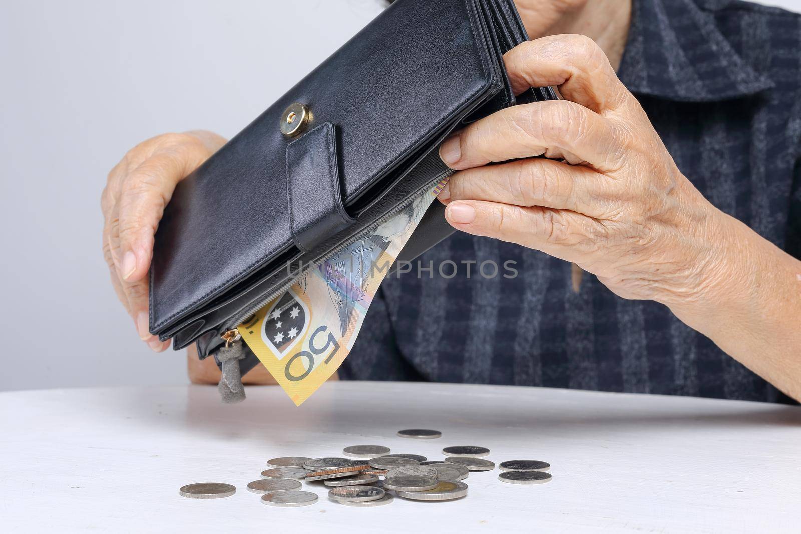 elderly woman having financial problems by toa55