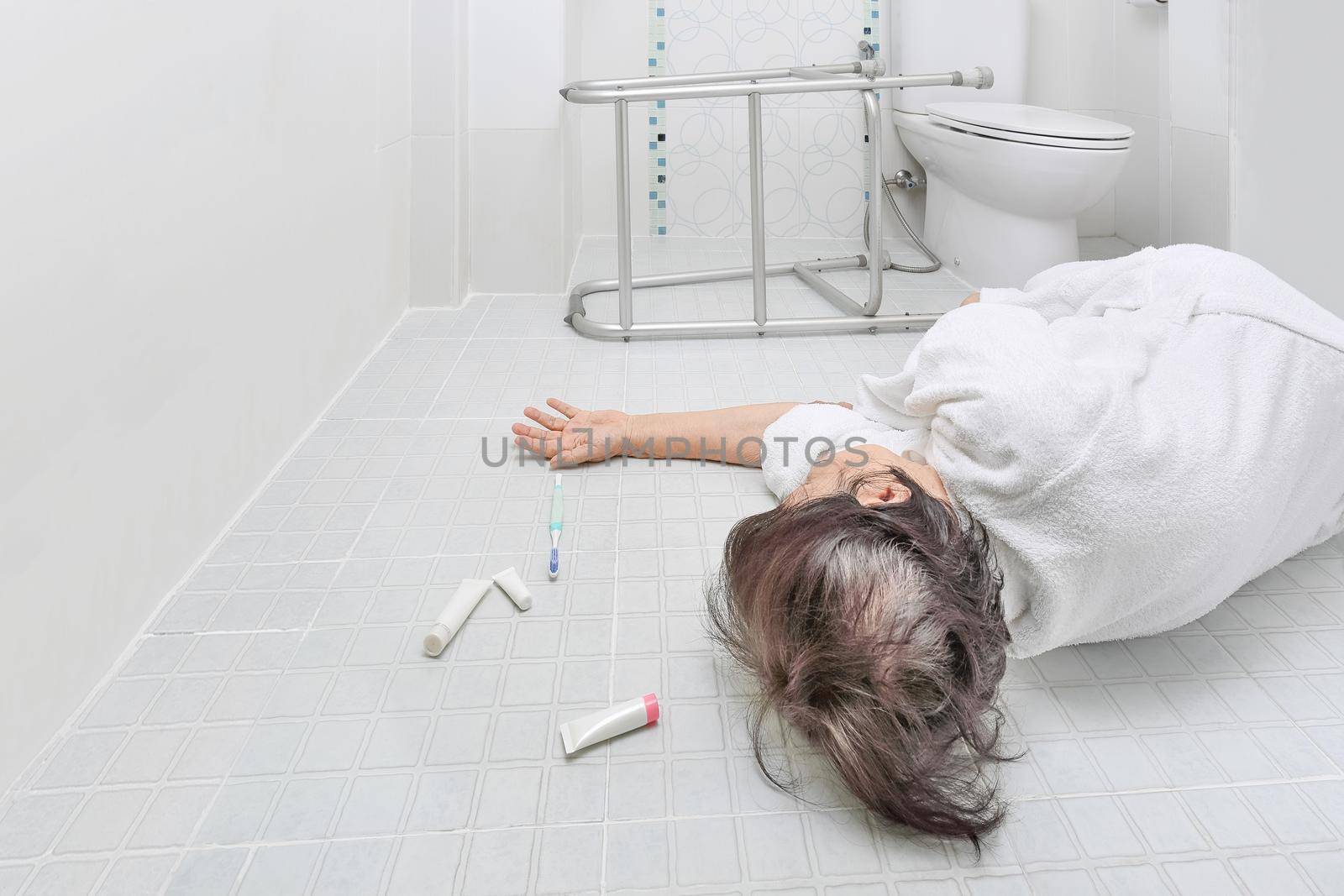 Elderly woman falling in bathroom because slippery surfaces by toa55
